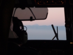 As we flew into Santiago, we could see, through the cockpit window, Mount Aconcagua sticking out above the cloud line of the Andes at sunset