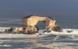 This sea arch off the coast of Antofagasta, Chile, doesn't have a dark rocky surface...